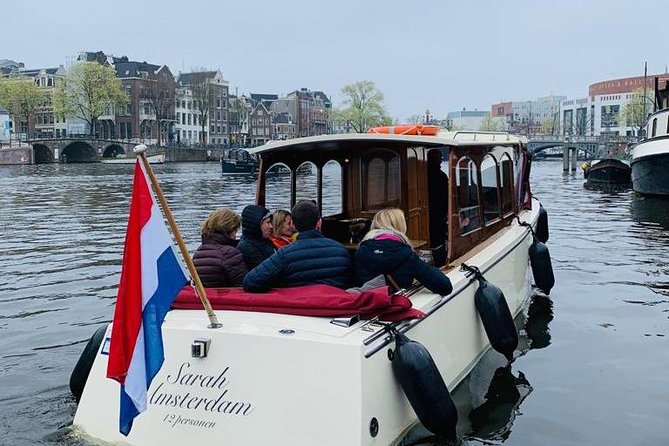 Small-Group Luxury Canal Cruise with Local Skipper - Passing the Anne Frank House from the water