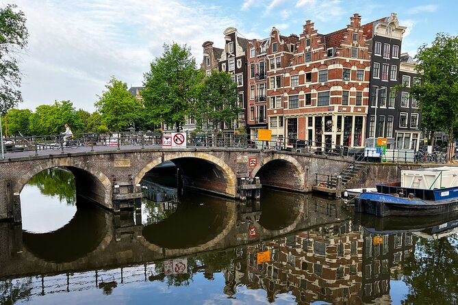 Small Group Walking Tour in Amsterdam with Friendly and Fun Guide - Dam Square and Damstraat: Amsterdam starts here