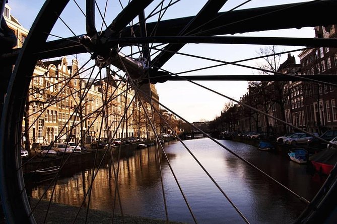 Urban Adventures Amsterdam Bike Tour, Graffiti and Magnet Fishing - Pllek brings a casual industrial stop