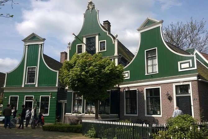 Zaanse Schans Windmills, Clogs and Dutch Cheese Small-Group Tour from Amsterdam - Inside Molen De Kat, the paint windmill